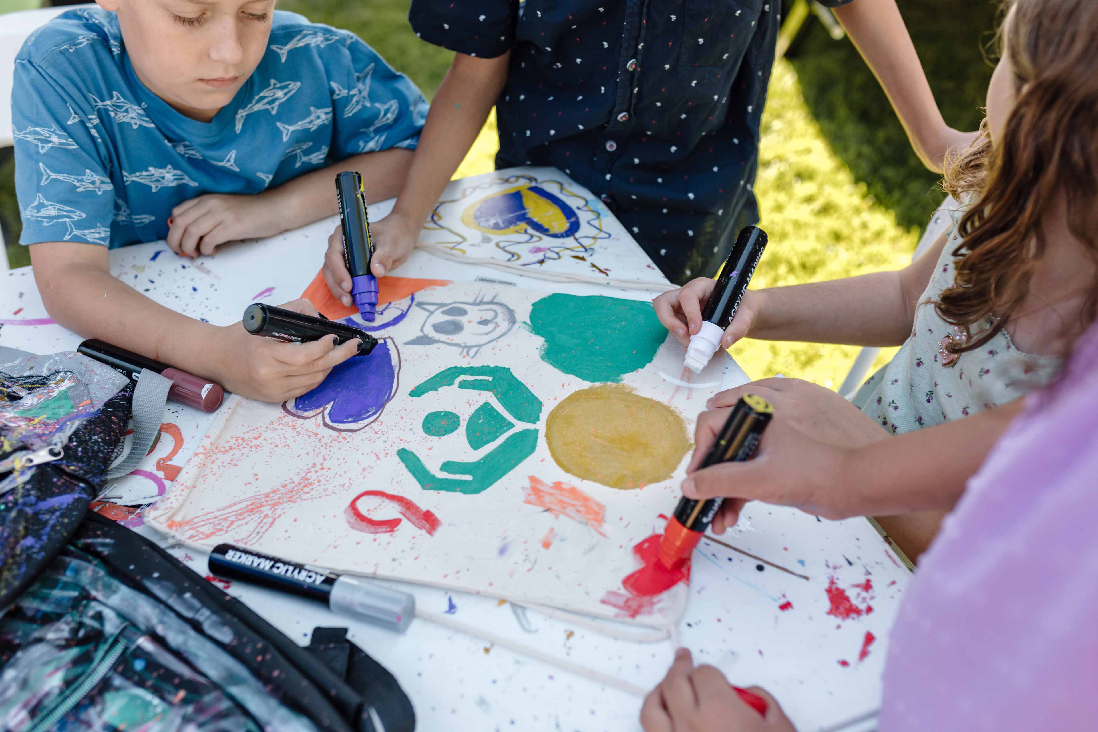 kids painting a mural